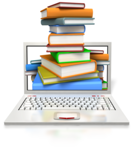 books and a laptop for writing research