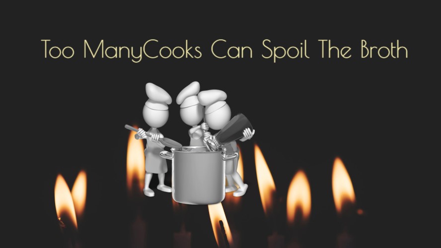 3 cooks at a pot over a fire