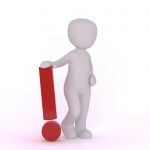 figure leaning on red exclamation point