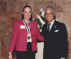 Nancy Wyatt with Governor Doug Wilder bestowing Governor's Gold Medal Award for voluntarism