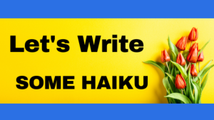 Blue and Yellow sign with red tulips. "Let's Write Some Haiku."